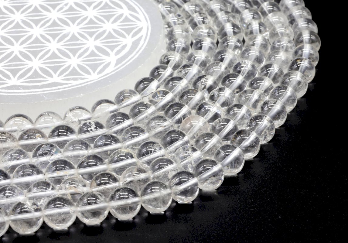 Perle di cristallo di rocca da 10 mm su un filo da 40 cm