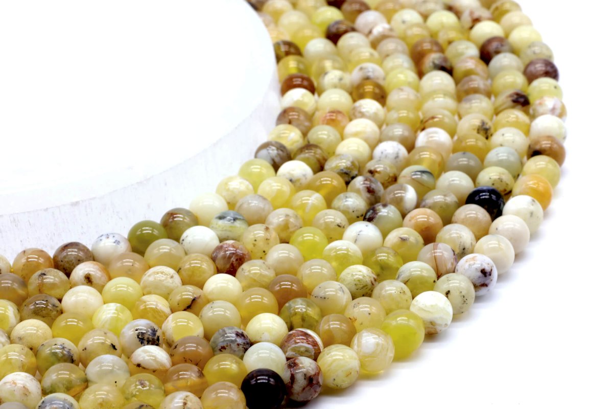 Perle di opale giallo 6 mm su un filo di 40 cm