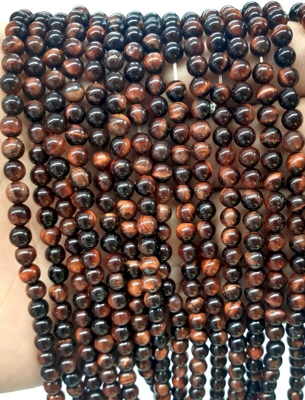 Bull's Eye Beads 4mm su un filo di 40cm