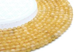 Perle di calcite arancione 6 mm su un filo di 40 cm