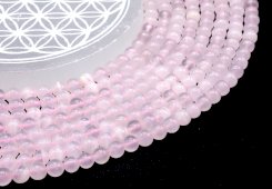 Perle di calcite rosa da 6 mm su filo da 40 cm
