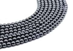Perle di ematite da 6 mm su filo da 40 cm